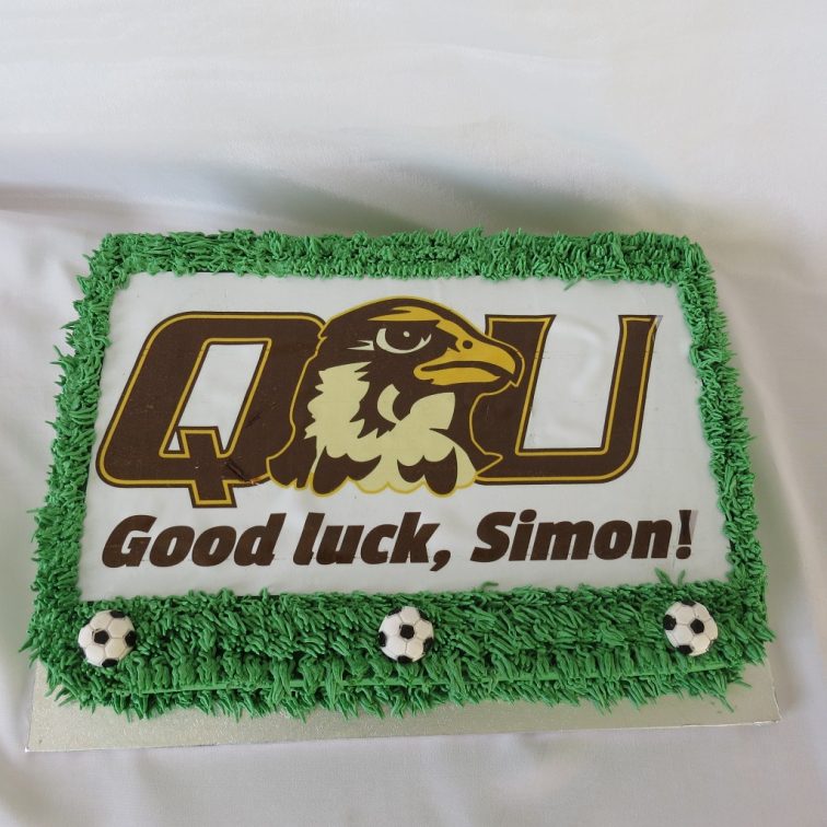 Quincy university soccer logo cake with edible image
